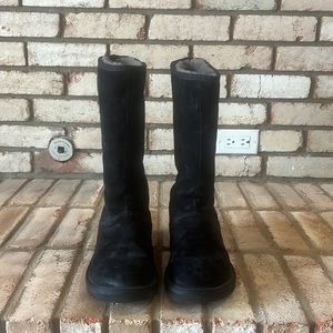 Like new Ugg boots. Special edition with silver and black zipper. Size 7!